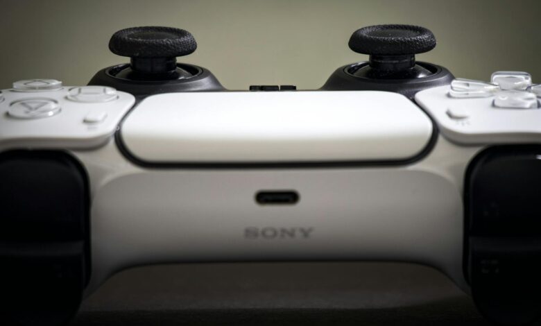 Detailed view of a Sony PlayStation 5 DualSense controller, highlighting design and features.