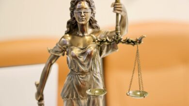 Detailed image of Lady Justice statue, symbolizing fairness and impartiality.