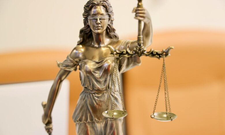 Detailed image of Lady Justice statue, symbolizing fairness and impartiality.
