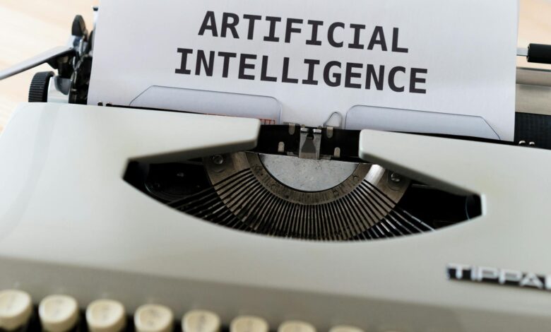 A close-up of a typewriter showcasing 'ARTIFICIAL INTELLIGENCE' on paper.