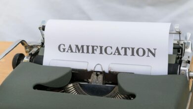Close-up of a vintage typewriter displaying the word 'Gamification' on paper.