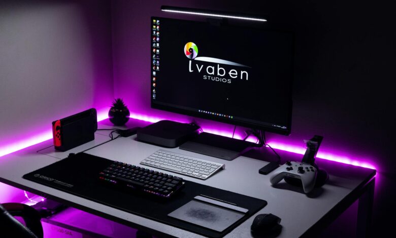 A stylish gaming area featuring LED lighting, gaming console, and modern peripherals.