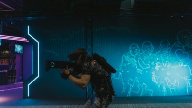 A man fully engaged in an immersive virtual reality gaming experience indoors.