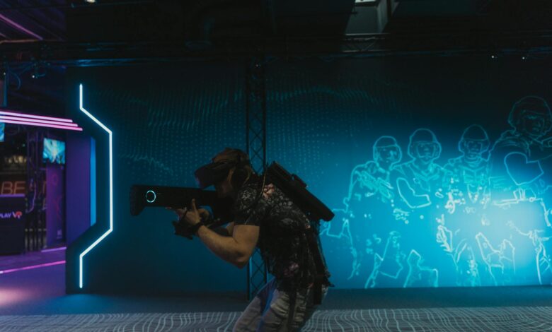 A man fully engaged in an immersive virtual reality gaming experience indoors.