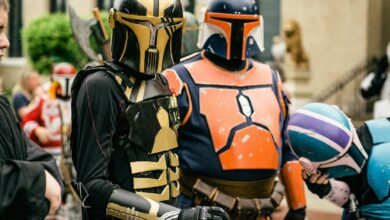 Colorful Star Wars cosplay event in Joliet, featuring detailed Mandalorian costumes and helmets.