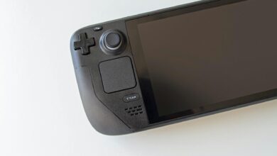 High-resolution image of a handheld gaming console on a white background.