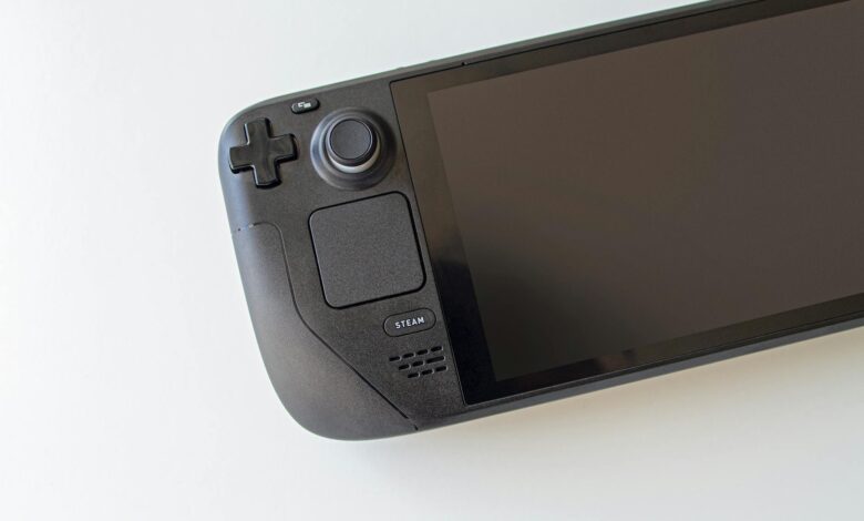 High-resolution image of a handheld gaming console on a white background.