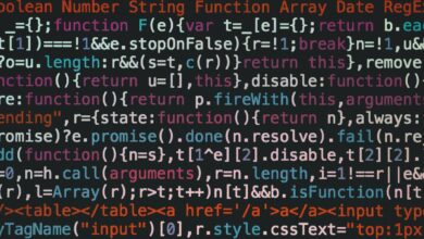 Close-up of colorful coding text on a dark computer screen, representing software development.