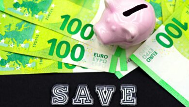 A piggy bank on euro bills with 'save' text highlights money saving concepts.