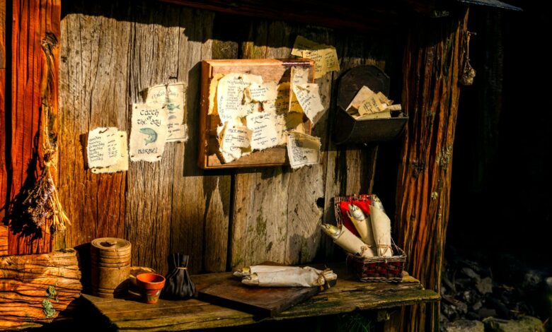 Charming rustic setup with scrolls and notes in Hobbiton, New Zealand.