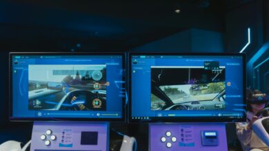 Immersive virtual reality gaming experience with dual screens and VR headsets, featuring driving simulations.