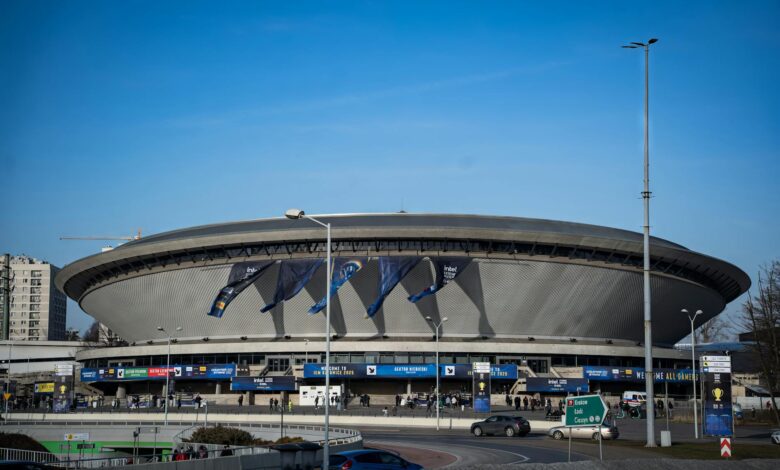 Spodek Arena in Katowice featuring a vibrant esports event atmosphere with banners.