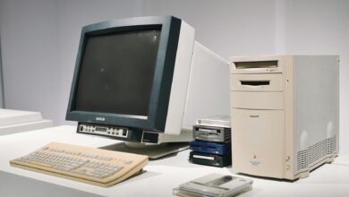 A retro computer setup featuring a classic CRT monitor and vintage CPU, showcasing technology history.