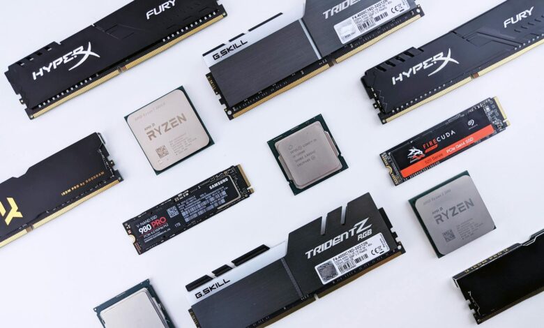 High-quality image of various computer components, including RAM and CPUs, on a white background.
