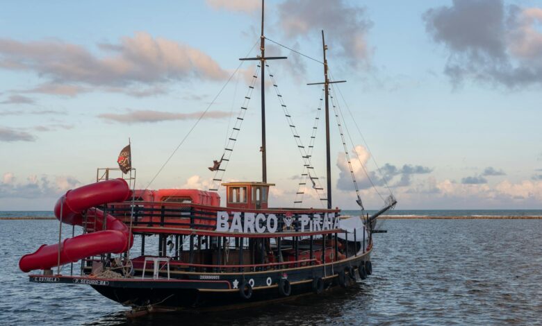 Scenic view of a pirate-themed ship during sunset in Arraial d'Ajuda, Brazil.