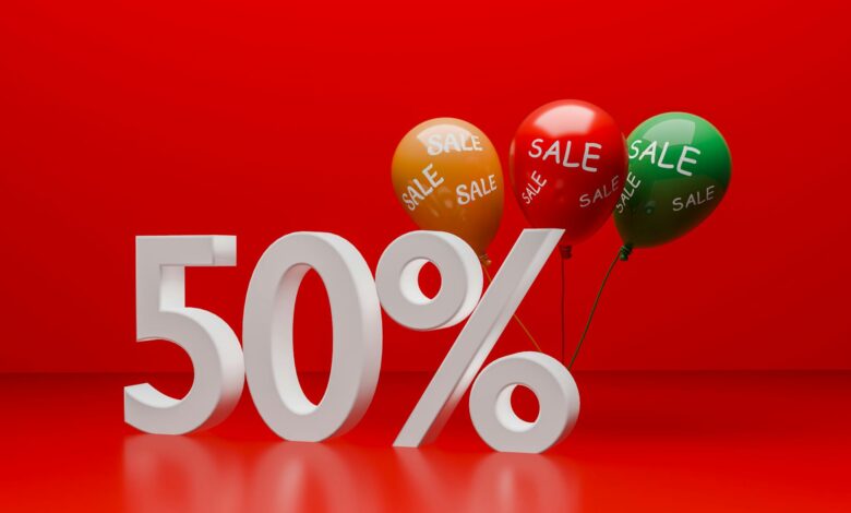 Bright red promotional image showcasing a 50% sale with balloons.
