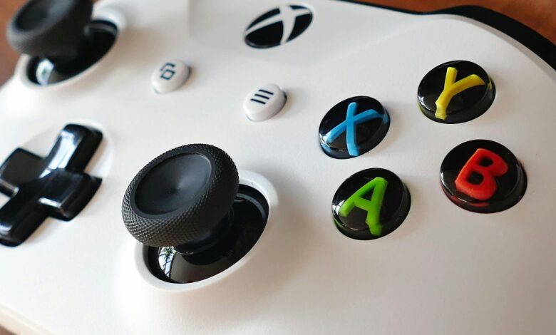 Close-up image of an Xbox controller highlighting buttons and joysticks.
