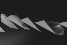 Minimalist black and white image featuring abstract geometric shapes on a dark background.