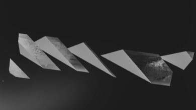 Minimalist black and white image featuring abstract geometric shapes on a dark background.