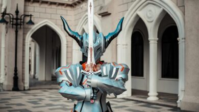 A person in detailed fantasy armor holding a sword in front of an architectural backdrop, creating a dramatic atmosphere.