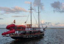 Scenic view of a pirate-themed ship during sunset in Arraial d'Ajuda, Brazil.