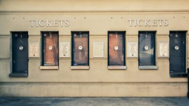 Row of closed ticket booths in Baltimore city center, showcasing urban architecture.