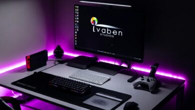A stylish gaming area featuring LED lighting, gaming console, and modern peripherals.