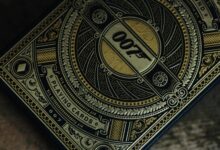 Elegant 007 playing cards featuring detailed gold and black design, perfect for collectors.