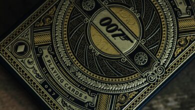 Elegant 007 playing cards featuring detailed gold and black design, perfect for collectors.
