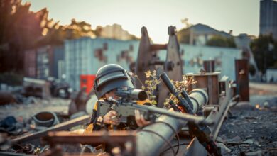 Person with helmet aiming toy gun in urban setting. Conceptual scene with dramatic effect.