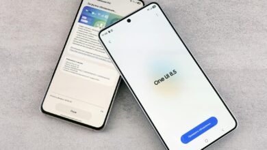 Two smartphones are shown displaying a software update screen with One UI 8.5.