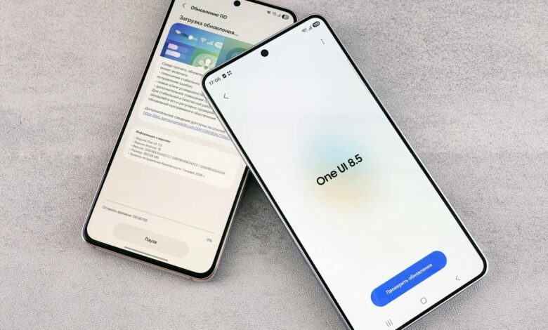 Two smartphones are shown displaying a software update screen with One UI 8.5.