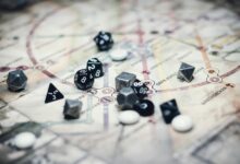 A collection of multi-sided dice on a detailed map, ideal for gaming enthusiasts