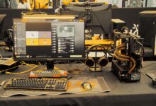 Modern gaming gear setup on display at a tech expo.