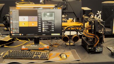 Modern gaming gear setup on display at a tech expo.