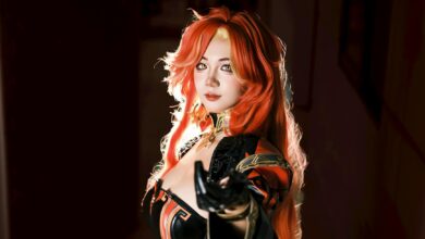 Striking cosplay portrait featuring a red-haired character in dynamic lighting. Perfect for fantasy themed projects.
