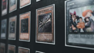 A close-up view of Yu-Gi-Oh! trading cards in a display case showcasing rare and collectible cards.