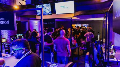 Vibrant arcade room filled with gamers participating in a competitive tournament under violet lighting.