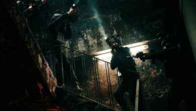 Special forces team conducting a tactical operation in a dimly lit, abandoned building.