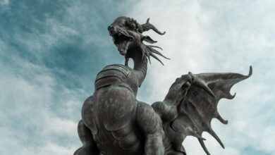 Bronze dragon statue with wings and detailed features in Kazan, Russia.