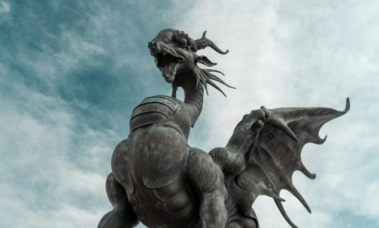 Bronze dragon statue with wings and detailed features in Kazan, Russia.