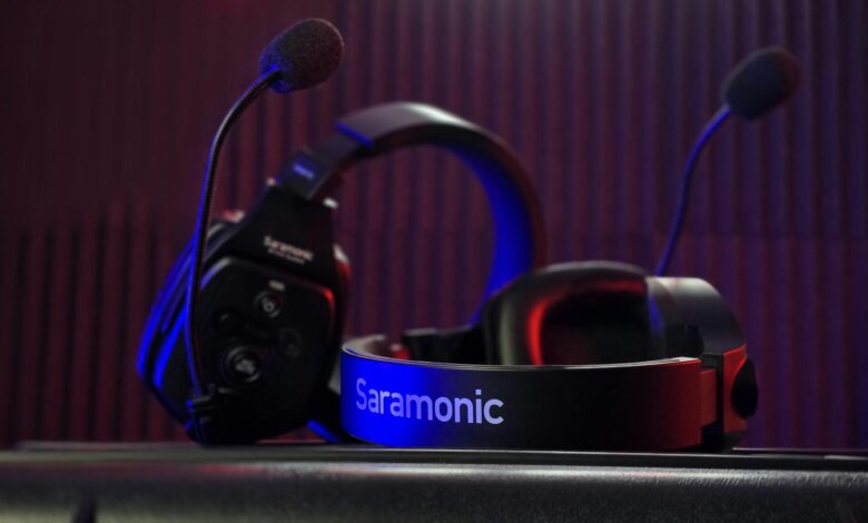 Close-up of a professional Saramonic headset with dual microphones in a studio setting.