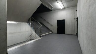 A modern and minimalist concrete stairwell showcasing industrial architecture.