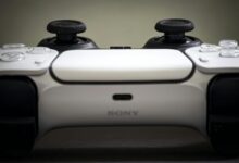 Detailed view of a Sony PlayStation 5 DualSense controller, highlighting design and features.