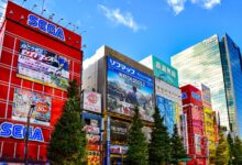 Colorful display of buildings and signs in Akihabara, Tokyo, showcasing city life and vibrant urban culture.