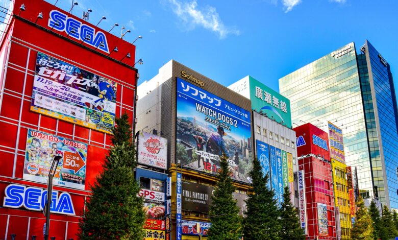 Colorful display of buildings and signs in Akihabara, Tokyo, showcasing city life and vibrant urban culture.