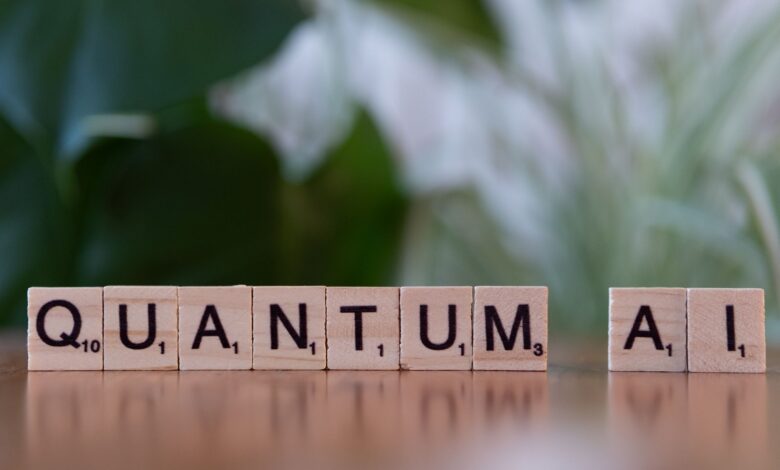 Wooden letter tiles spelling 'Quantum AI' on a blurred background.