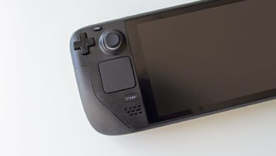High-resolution image of a handheld gaming console on a white background.