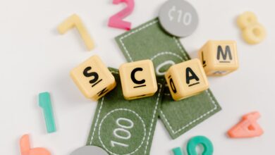Visual representation of a scam concept using toys, dice, and fake money on a white background.
