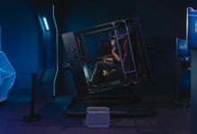 A person using a VR simulator in a high-tech gaming environment.